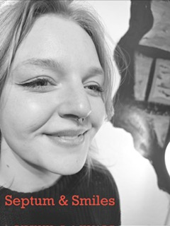 Septum piercing and tooth bling — Skin Lab client selfie.