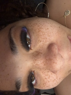 Bold plum smoky liner with volume lashes — evening glam at Skin Lab.