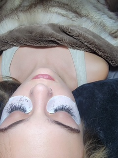 Fresh volume lash set — close-up during application.