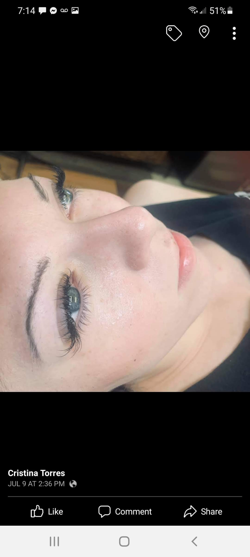 Post-facial glow with a fresh lash set — client at Skin Lab.