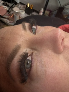 Custom volume lash set close-up — mapped to the client's eye shape.