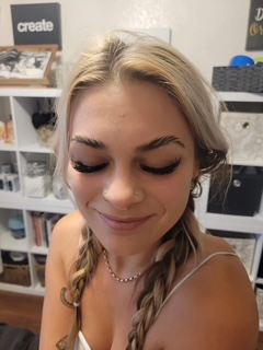 Close-up of soft glam makeup and lashes at Skin Lab.